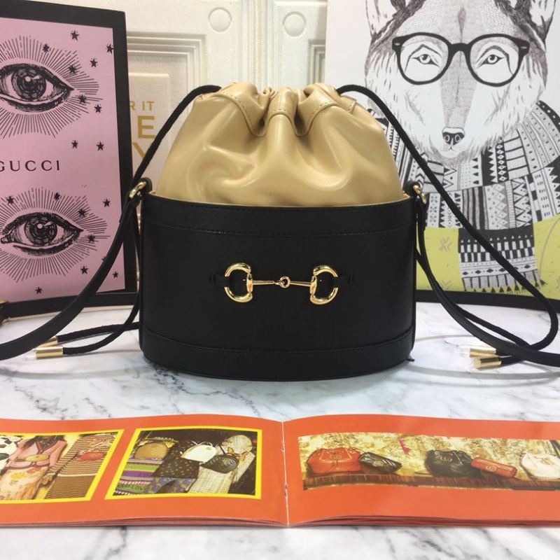 G*u*i bucket bags